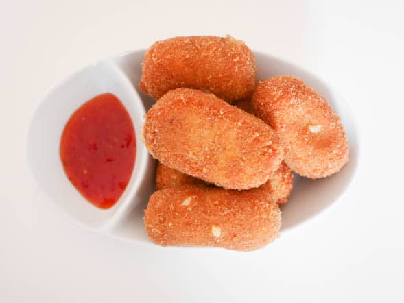 Geitenkaaskroketjes met pancetta | Foodaholic.nl